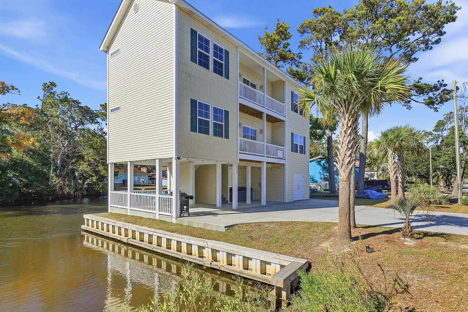 Banana Villa waterfront exterior with dock